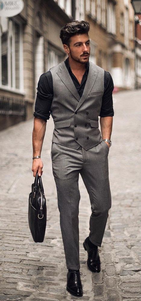 black suit with waistcoat outfit.